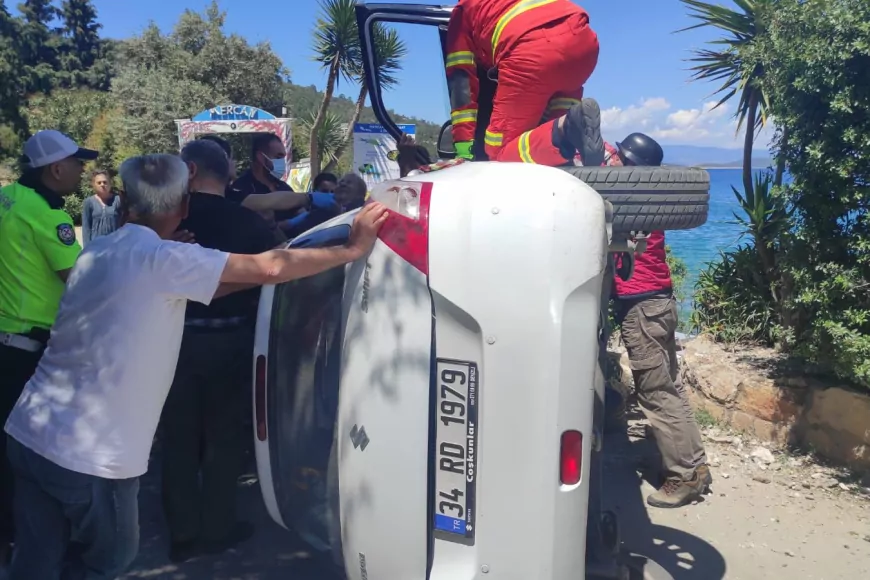 Muğla Bodrum’da Suzuki Swift Yan Yattı, Araçta Mahsur Kalan Yaralı Kurtarıldı