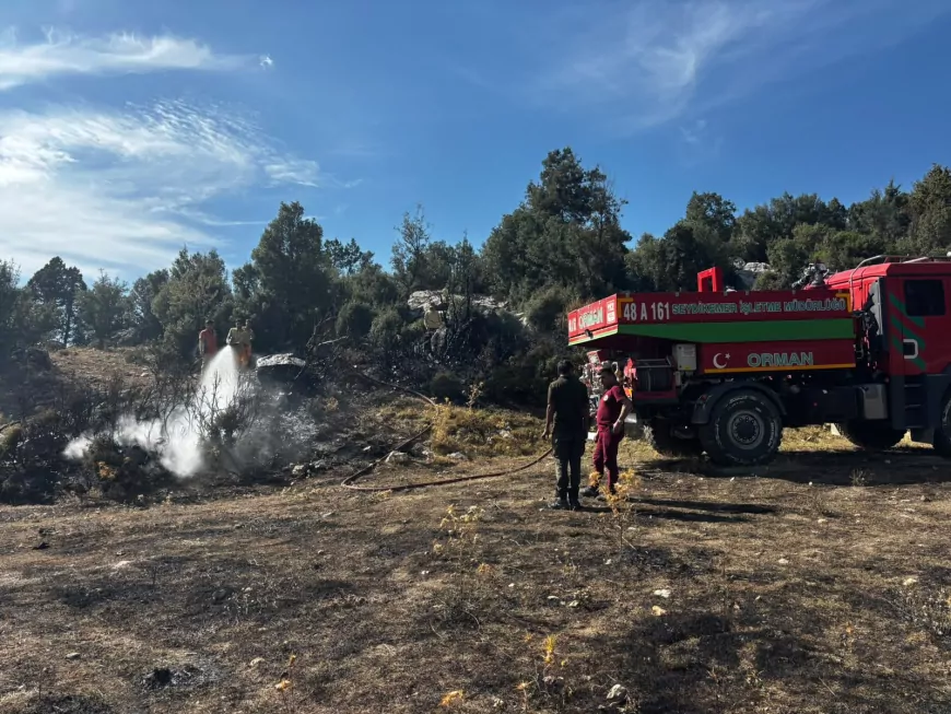 Seydikemer Yaylakaraçulha’da zirai arazide çıkan yangında 10 dönüm otluk ve makilik alan zarar gördü